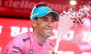 Italy's Vincenzo Nibali celebrates in the maglia rosa of the overall leader of the Giro d'Italia